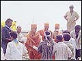 Distributing foodgrains as part of the relief effort in cyclone-hit south Gujarat