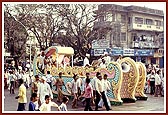 Colorful floats with deities divinized the festive procession