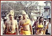  The colorful procession on 23 November through the streets of Amdavad was a pageant of floats and youths adorned as pious characters from India's glorious spiritual past 