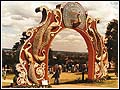 Peacock Gate ornately made of  bamboo and burlap