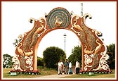 Peacock Gate ornately made of bamboo and burlap
