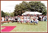 Colorful traditional folk dances performed on festival ground 