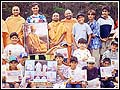 Children with saints at the Towards Better Living Camp, New Zealand