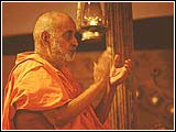 Swamishri engrossed in dhun during the celebrations