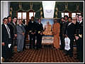 Atmaswarup Swami presents a gift to the Admiral