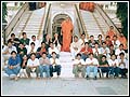 The balaks with Swamishri at the steps of Bochasan Mandir