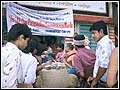 Supplying food materials to the flood victims