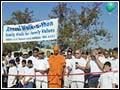 Participants gather before the start of the walk