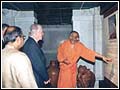 President Carter is shown the 'Inspirer' panel in the exhibition