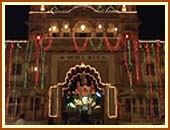 The majestic Akshar Gate, resplendent in Diwali lights, leading in to Akshar Mandir, Gondal.