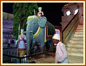 Devotees gather at the mandir in the early hours of the morning