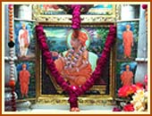 The holy charanarvind and murtis at the Akshar Deri, the shrine erected over the samadhi of Gunatitanand Swami