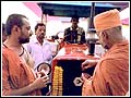 Sadhus perform pujan of machinery to be used in the reconstruction process