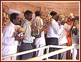 Devotees performing Maha-Abhishek by pouring holy water brought from 108 rivers 