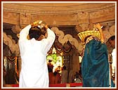 Devotees performing Maha-Abhishek by pouring holy water brought from 108 rivers 