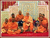 Swamishri with sadhus involved in tribal upliftment activities