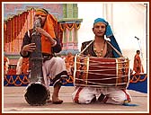 Children play traditional instruments