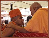 Finally, Swamishri crowns the ceremony by applying Chandan and imparting the Diksha-mantra