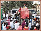 Lord Swaminarayan's murti majestically paraded on an elephant