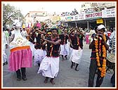 Music and dance were essential elements of the procession - a tribal dance and peacock dance adds color and rhythm during the 3 hour long procession