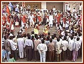 Traditional bamboo dance being performed - the girls dance and jump between bamboo poles being moved continuously 