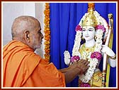 Performing Vedic worship (pujan) of Shri Sita-Ram and Hanumanji