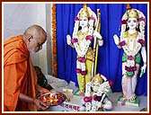 Performing Vedic worship (pujan) of Shri Sita-Ram and Hanumanji