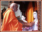 Performing the Vedic rites of worship and Maha-Abhishek for the murti of Shri Akshar Purushottam Maharaj