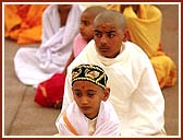 Swamishri blessed more than 20 children and youths at their sacred thread ceremony, which was held parallely with the mass marriage