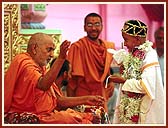 Swamishri blessed more than 20 children and youths at their sacred thread ceremony, which was held parallely with the mass marriage