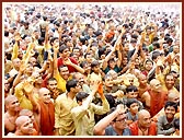Flushed in a spray of colored water, the devotees ecstatically relish the ultimate moments of the festival