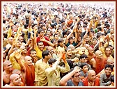 Flushed in a spray of colored water, the devotees ecstatically relish the ultimate moments of the festival