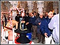 Devotees offer their respects to the Shiv-Lings