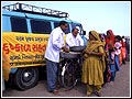 BAPS volunteers distribute Sukhadi  to women