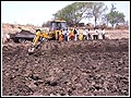 Excavation of silt at Veri Dam