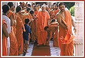 At 7:45 am Swamishri blesses all the sadhus in the pradakshina of the mandir