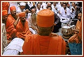 Swamishri during an assembly at Ambli Vali Pol