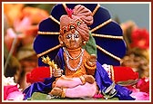 Lord Harikrishna Maharaj beautifully adorned in chandan