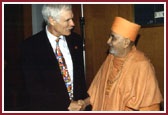 Dr. Ted Turner, CNN Chairman, congratulates Swamishri for his address