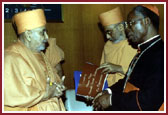 Swamishri with His Eminence Francis Cardinal Arinze, President of the Pontifical Council on Inter-religious Dialogue of the Vatican