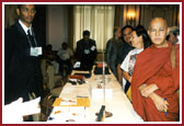 BAPS volunteers registering the delegates at the Astoria Hotel and making arrangements for their accomodation and transport for the 4-day Summit