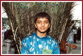 One of the BAPS children welcoming the delegates in a colorful costume