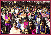 Guest and women devotees during assembly