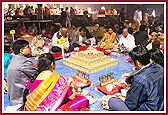 Participants of the World Peace Yagna perform rituals around the sacrificial fire