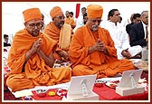 Senior sadhus and devotees participating in maha-puja