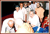  Swamishri honors and blesses senior citizens at a special evening function in Swaminarayan Nagar