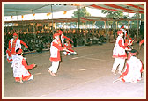 During Swamishri's morning puja, a total of 360 children from 31 different villages performed a 'maha-raas' - traditional dance around the audience and on stage