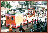 The murtis of deities were paraded in beautifully decorated floats on the streets of Anand