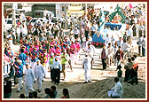 The colorful procession had troupes of tribal youths and teenage girls dancing and singing excitedly 