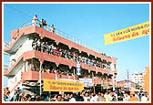 Crowds thronged to the streets and buildings to watch the spectacular procession   